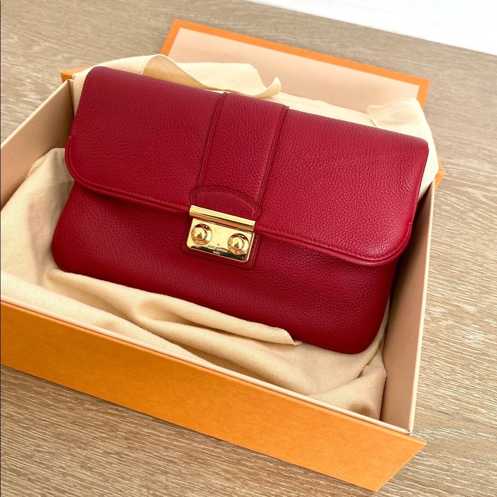 Gorgeous red leather Louis Vuitton Sofia Coppola clutch bag with gold hardware